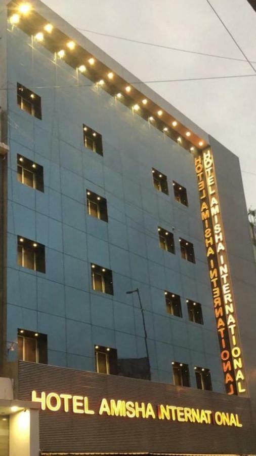 Hotel Amisha International Surat Exterior foto